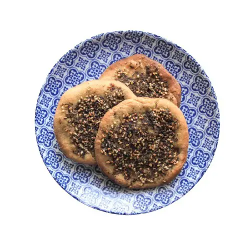 zaatar-manakeesh-lebanese-thyme-flat-bread-manakish-12-removebg-preview_500x500